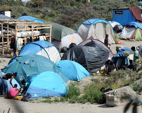 The 'jungle' in Calais near the entrance of the Eurotunnel where migrants camp out in the hopes of reaching Britain