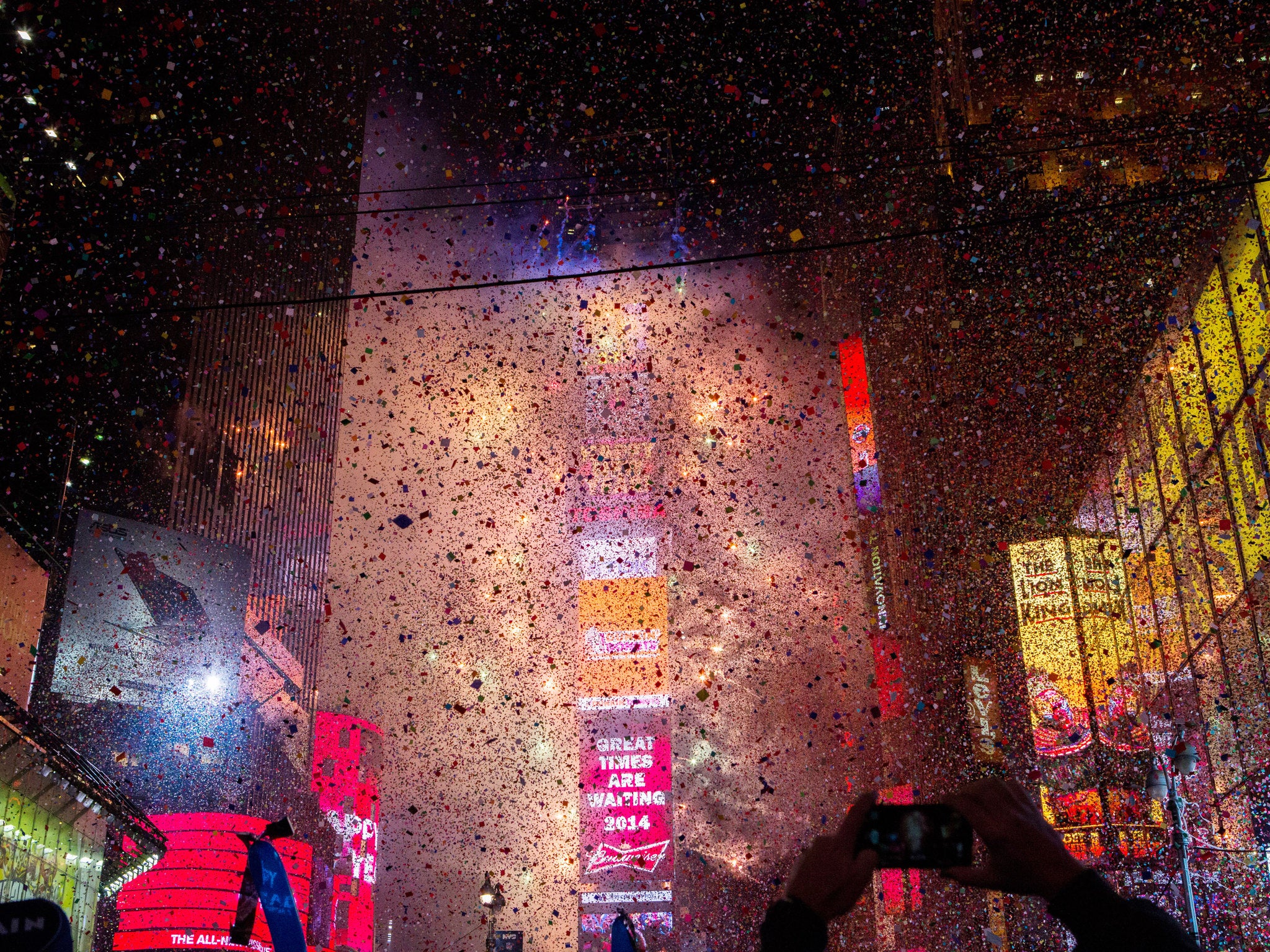 Confetti falls throughout Times Square during the New Years Eve celebration on January 1, 2013 in New York City