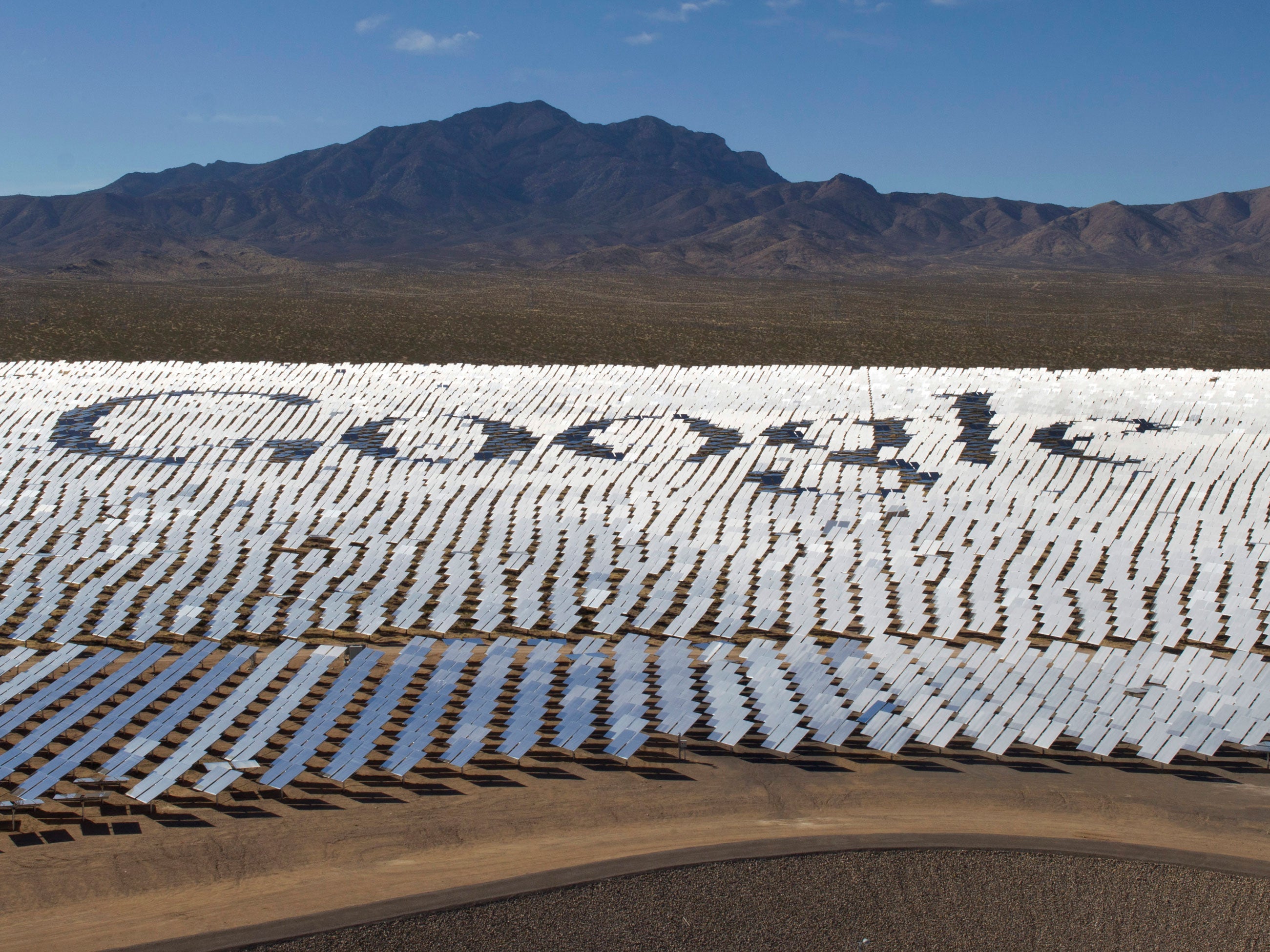 The Google logo is spelled out in heliostats (mirrors that track the sun and reflect the sunlight onto a central receiving point) during a tour of the Ivanpah Solar Electric Generating System in the Mojave Desert near the California-Nevada border February 13, 2014