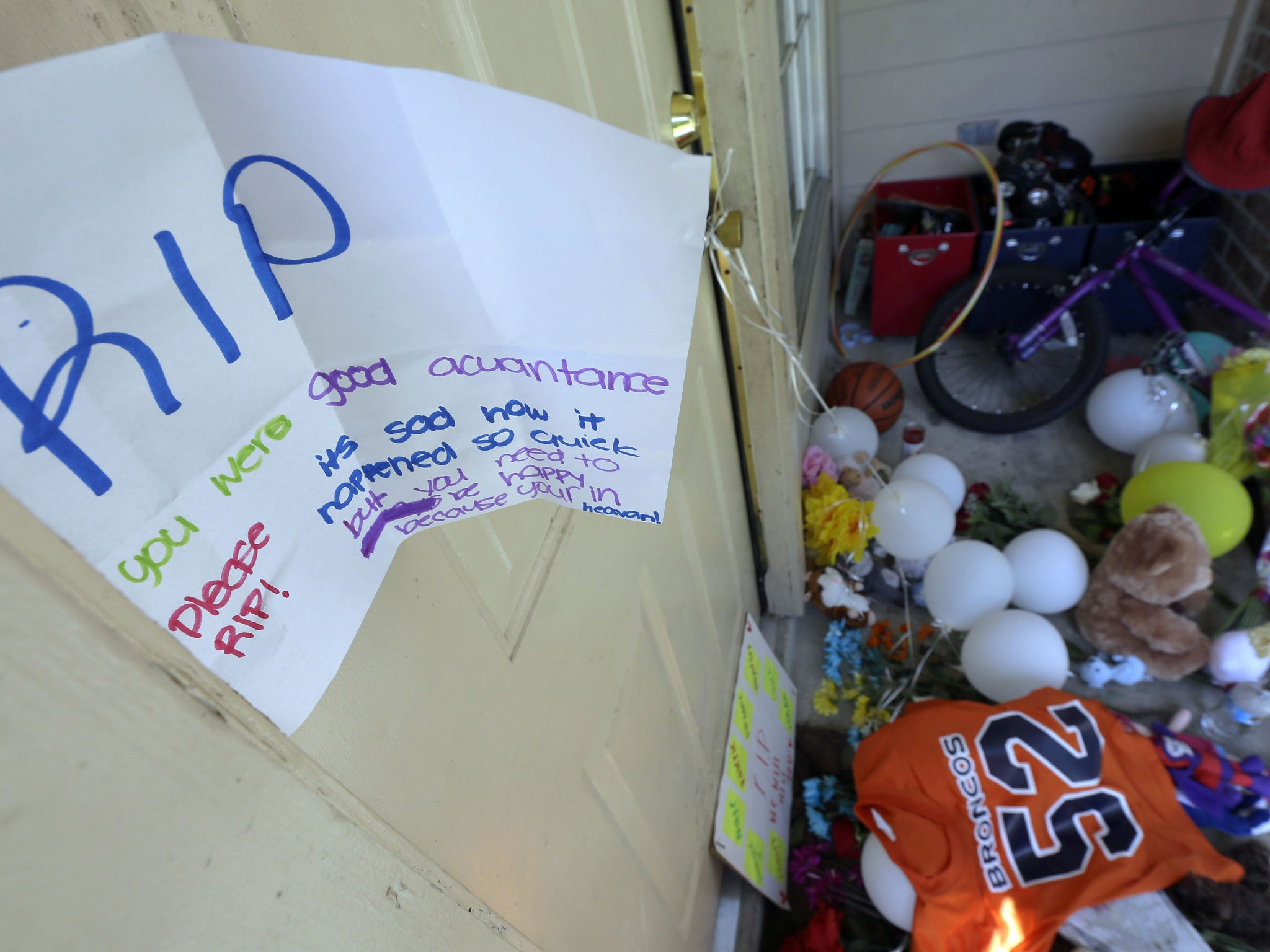 Condolences left outside the home where eight people were shot, allegedly by David Conley