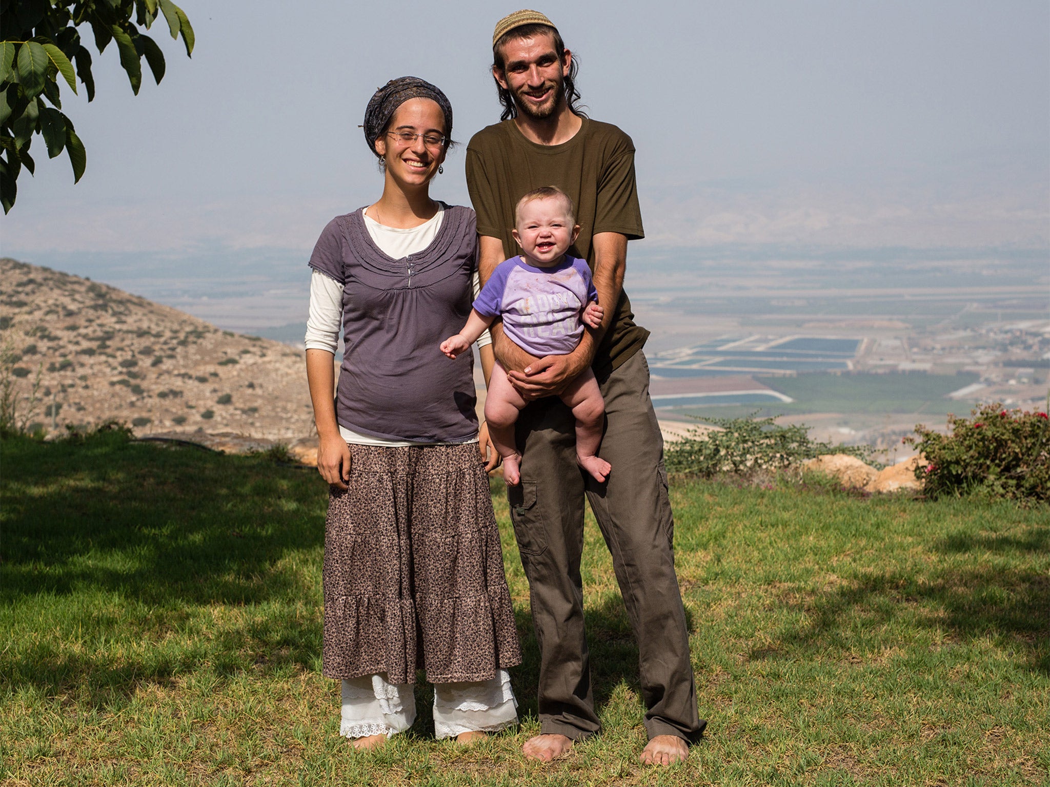 Aviya Morris with her husband Raphael and their daughter Liberty Zion in Merav, a religious Kibbutz on Mount Avinadav