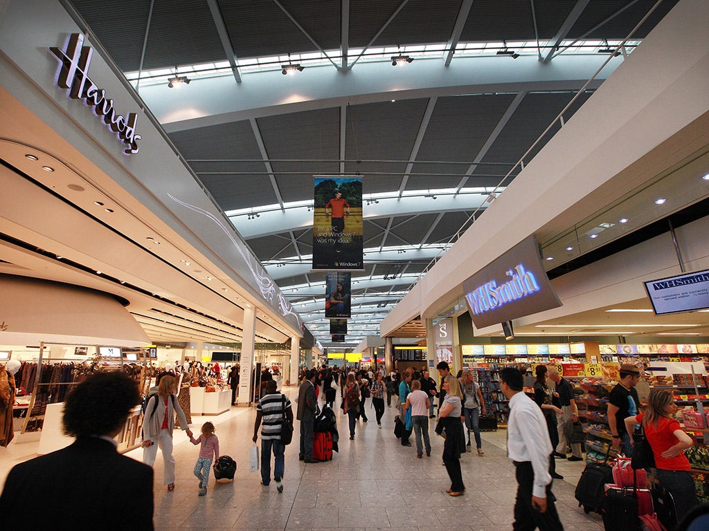 Airport passengers shopping at Heathrow terminal 5