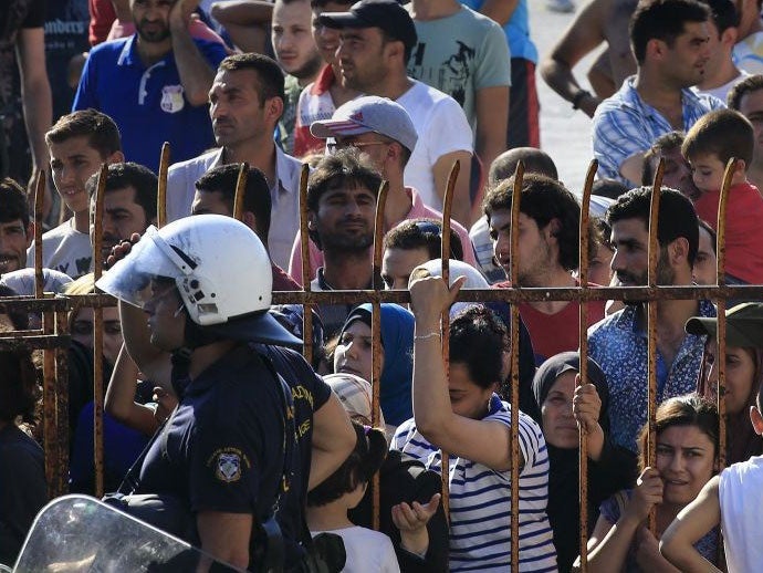 Greek riot police locked a thousand migrants in a stadium on Kos without food or water