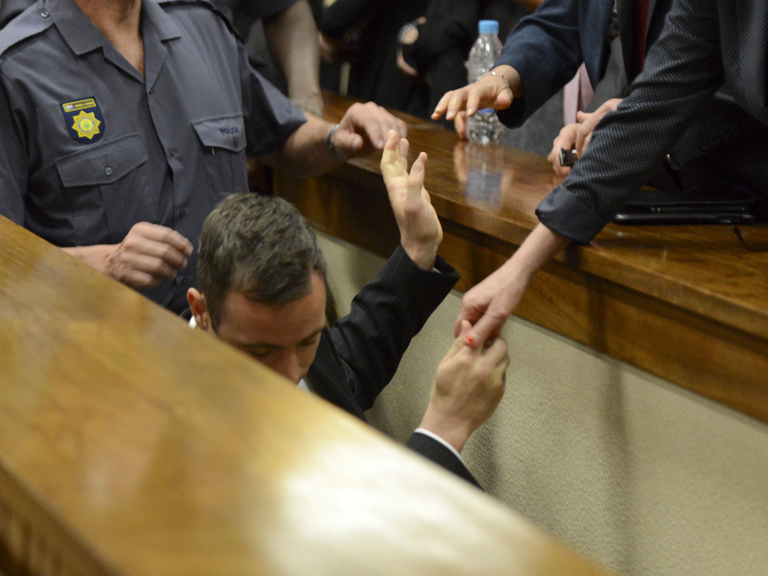 Oscar Pistorius leaving the Pretoria High Court after being sentenced on October 21, 2014