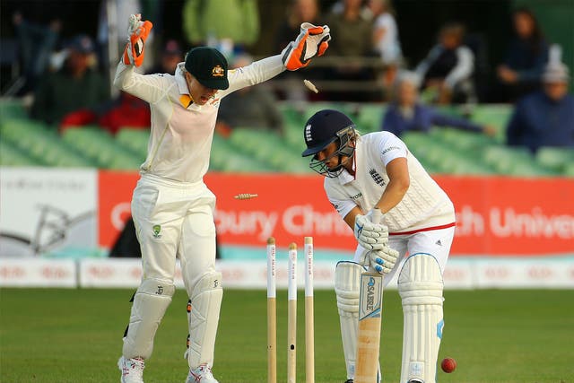 England’s Katherine Brunt is bowled by Sarah Coyte as Australia’s wicketkeeper Alyssa Healy looks on