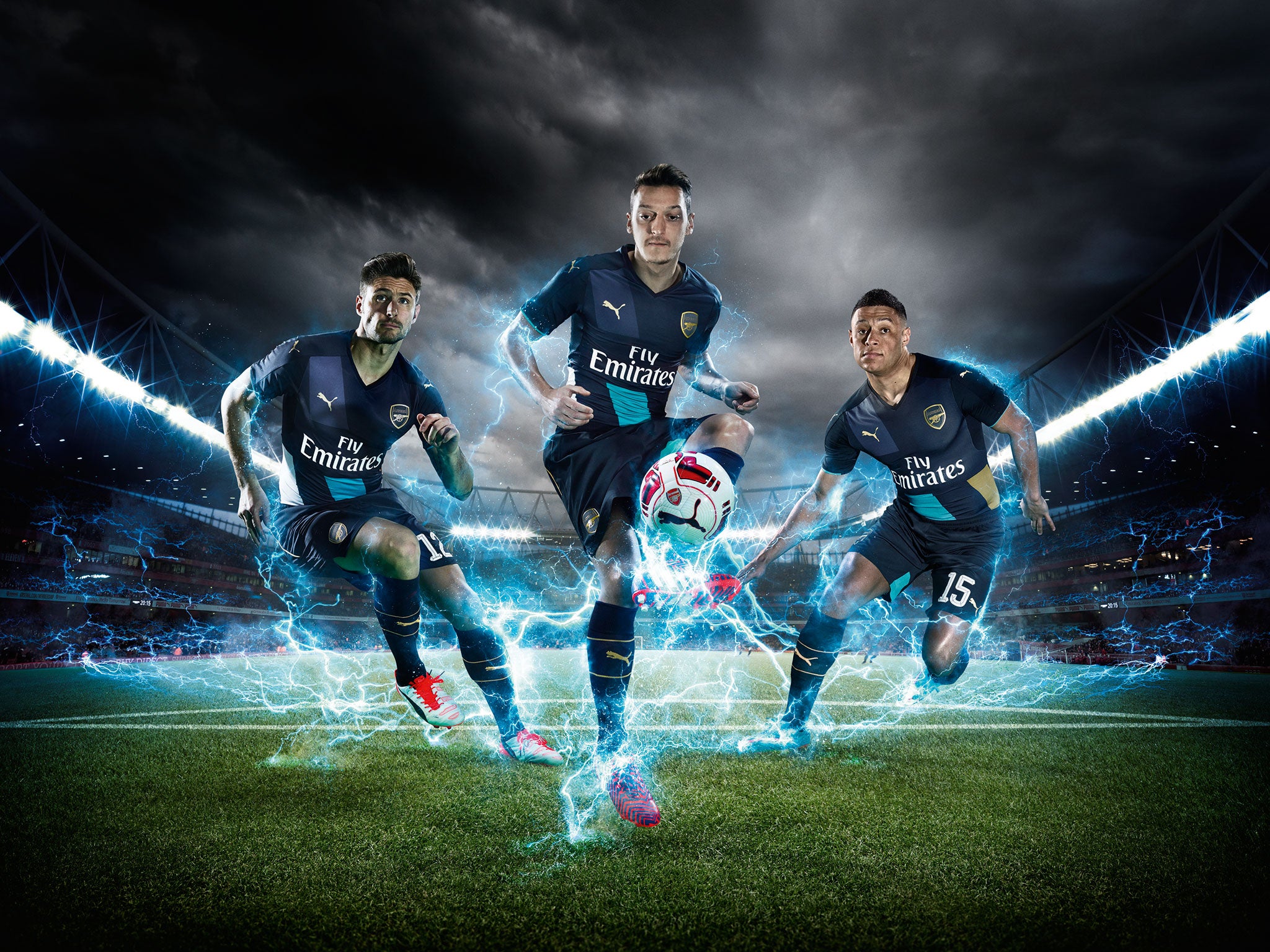 Olivier Giroud, Mesut Ozil and Alex Oxlade-Chamberlain in the shirt
