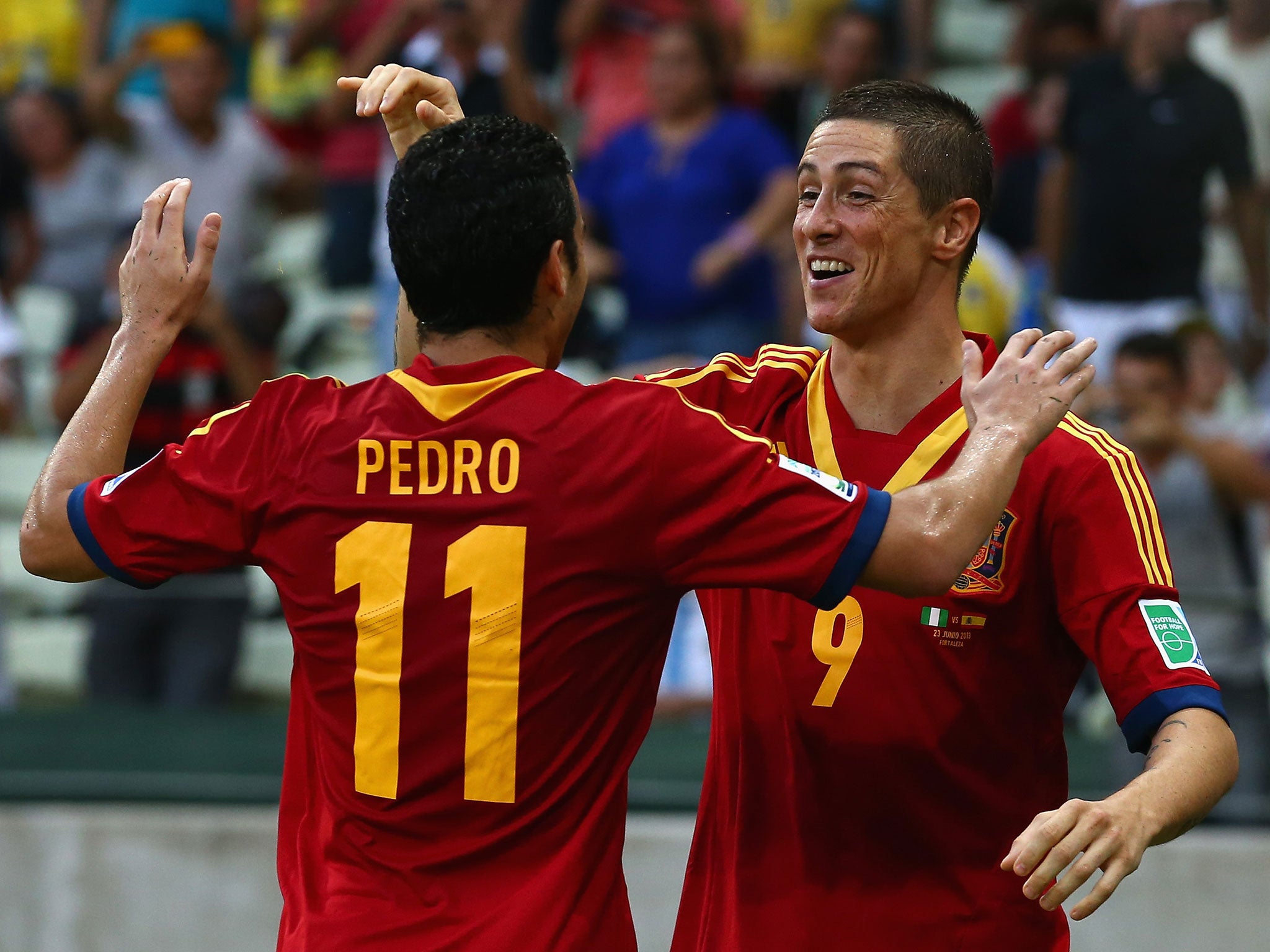 Fernando Tores celebrates with Pedro during the 2013 Confederations Cup