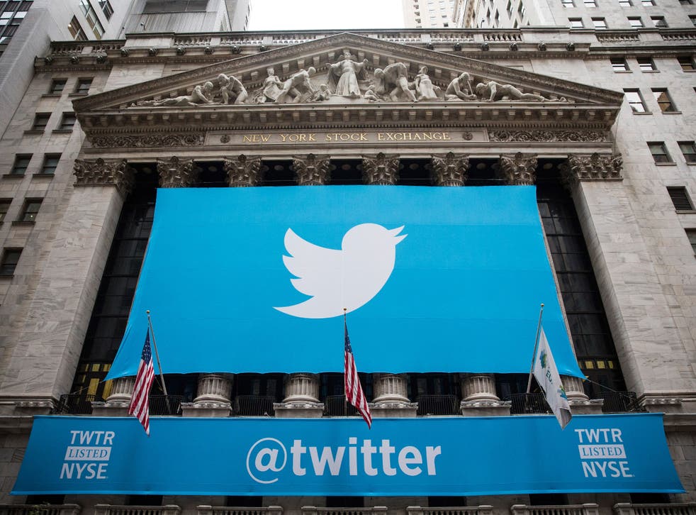 The Twitter logo is displayed on a banner outside the New York Stock Exchange (NYSE) on November 7, 2013 in New York City