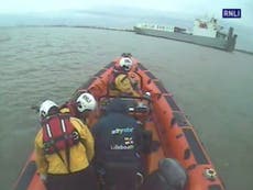 RNLI lifeboat crew rescue swimmer stranded in water for four hours off Gravesend coast - video