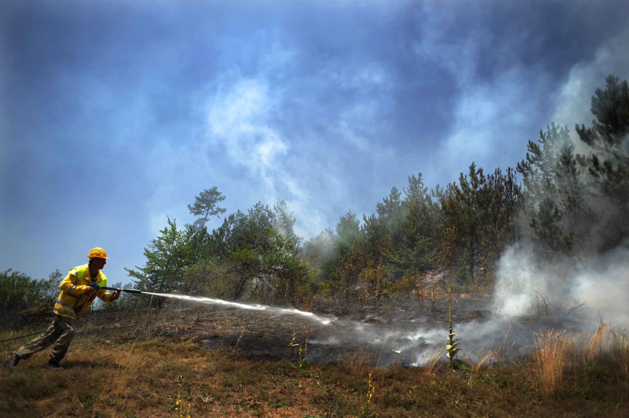 Things like forest fires, made worse by climate change, could impact tourism in places like Bulgaria (AFP/Getty)