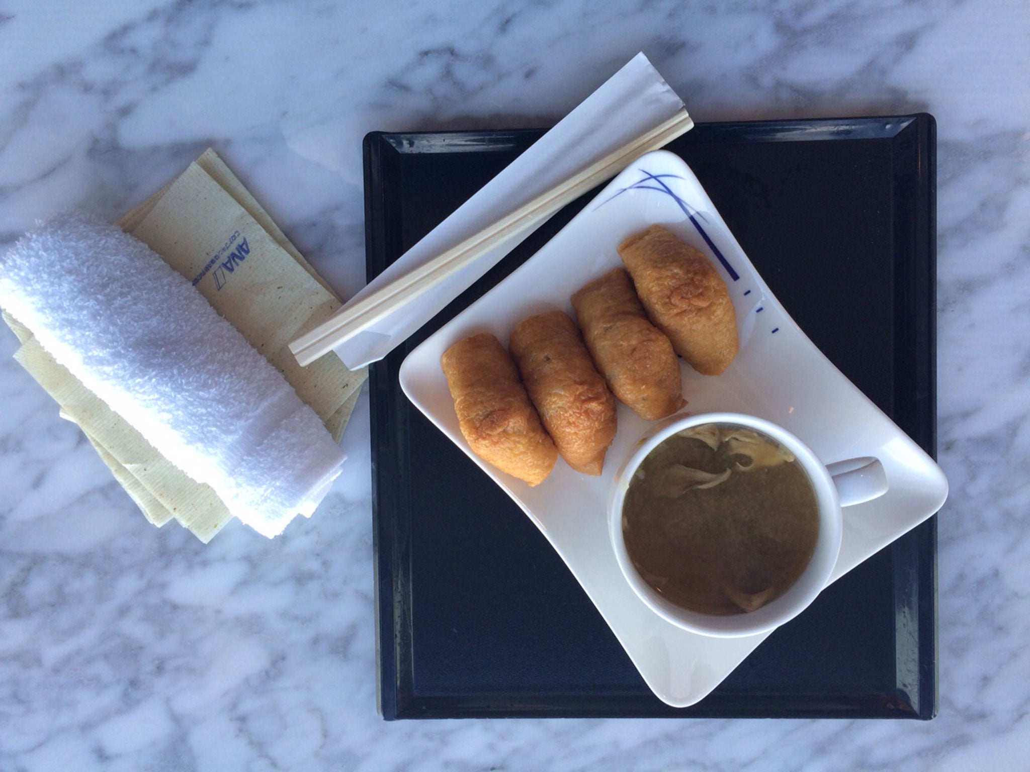 Flight fantastic: Sam ate miso soup and inarizushi (white rice in a fried tofu pouch)