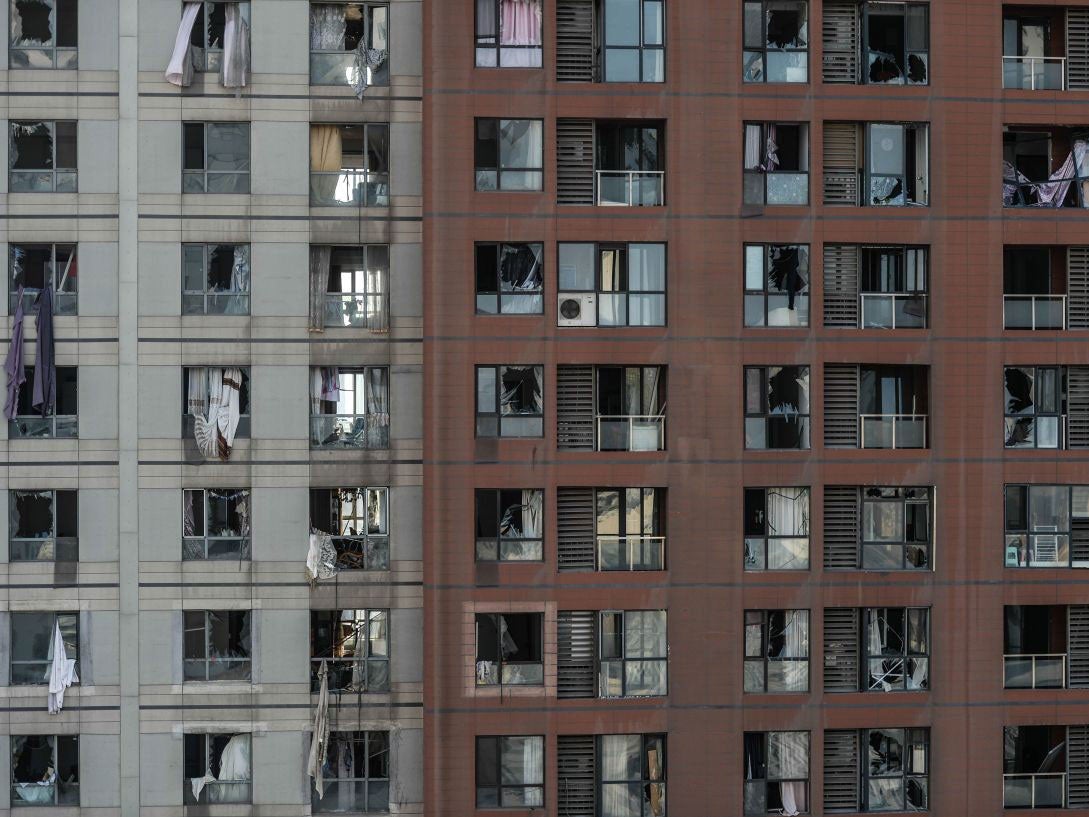 Windows were blown out of apartment buildings near the site of the explosions