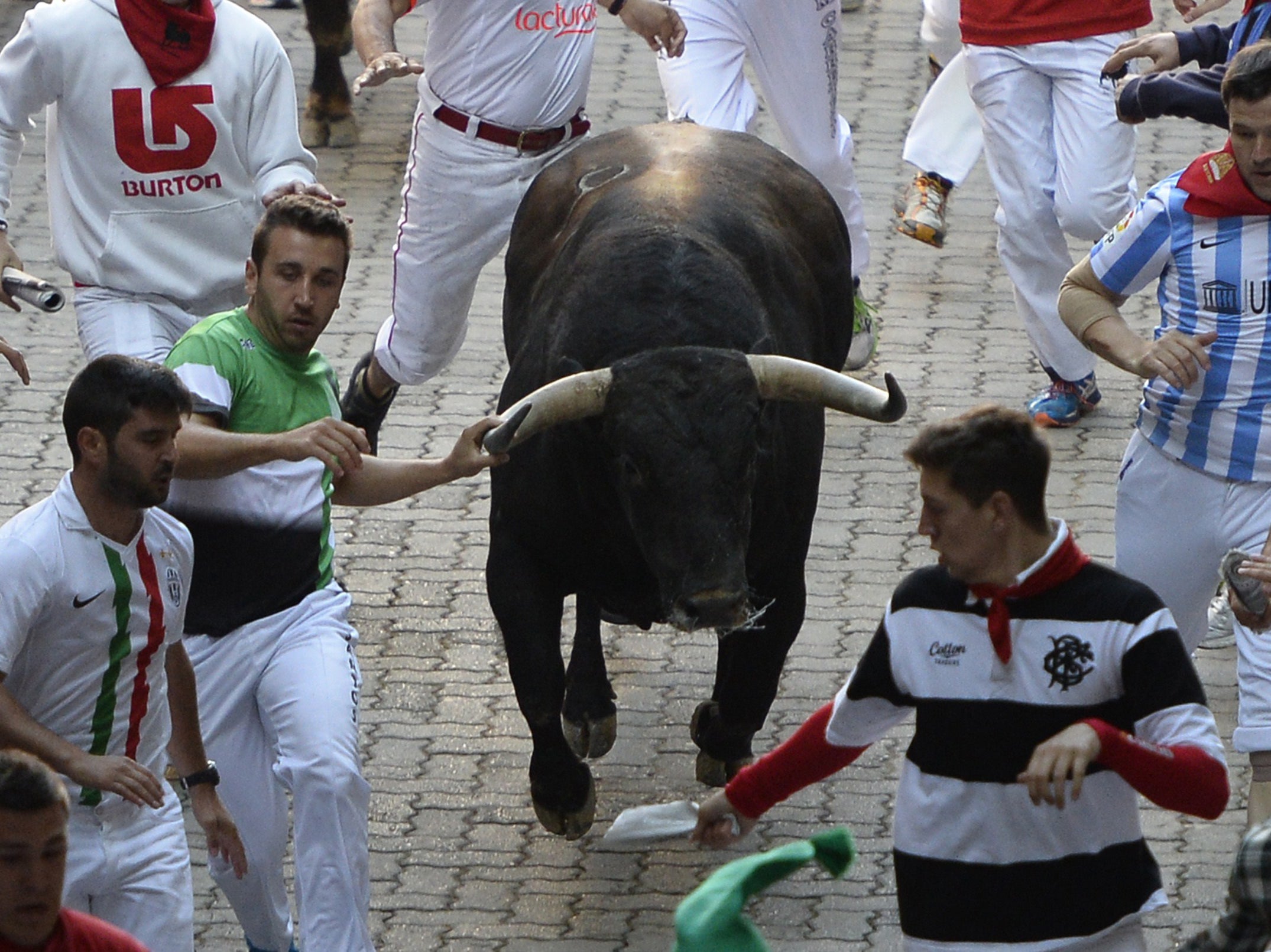 Participants in the San Fermin Festival in Pamplona, northern Spain, on July 10, 2015