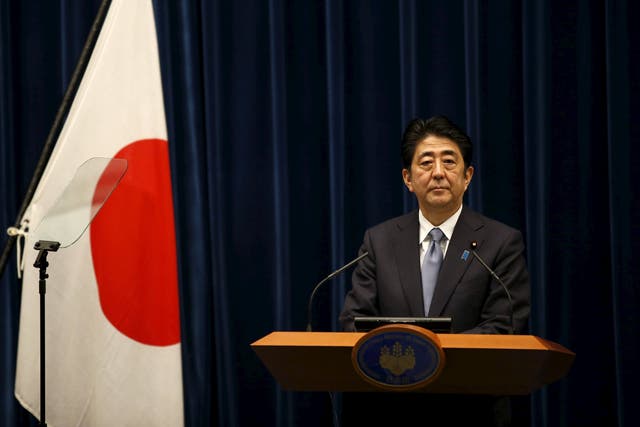 Japan PM Shinzo Abe at news conference marking the 70th anniversary of World War II end (Toru Hanai/Reuters)
