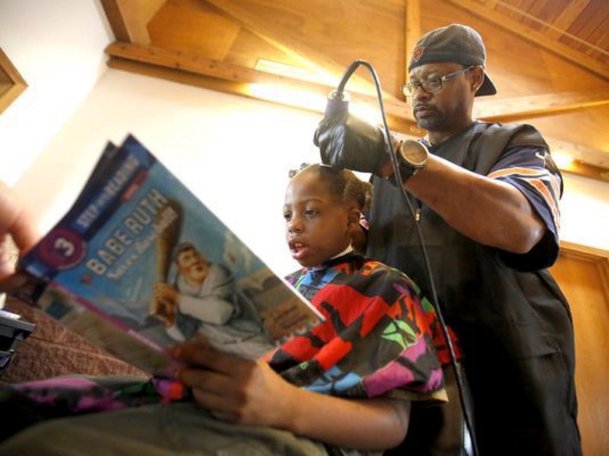 The barber who gives free hair cuts to children - as long as they are  reading | The Independent | The Independent