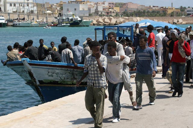 Eritrean asylum seekers arrive in southern Italy (AFP/Getty)