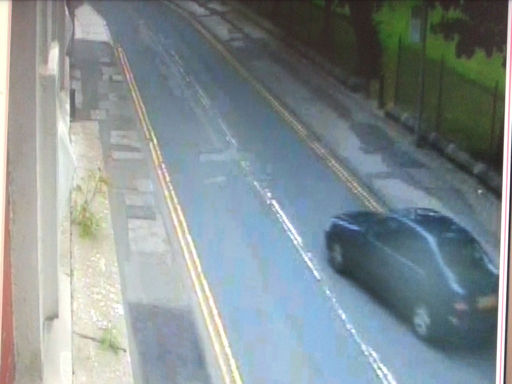 The woman is shown on CCTV being bundled into Blue Honda Civic