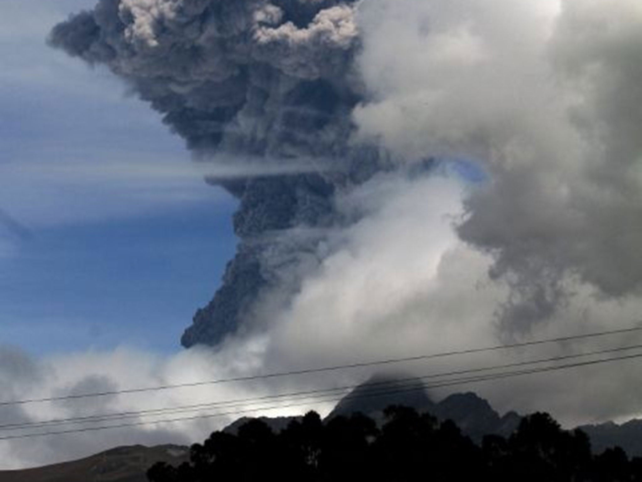 The Cotopaxi volcano spewing ashes from Aloag, Pichincha province, Ecuador