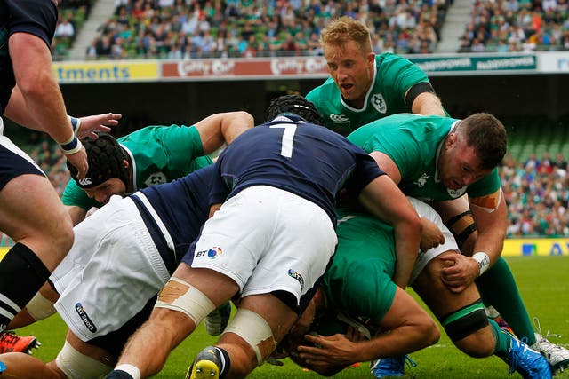Ireland’s Chris Henry scores his side’s first try in their World Cup warm-up victory over Scotland in Dublin