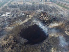 China warehouse explosion: Tianjin workers race to clear site of