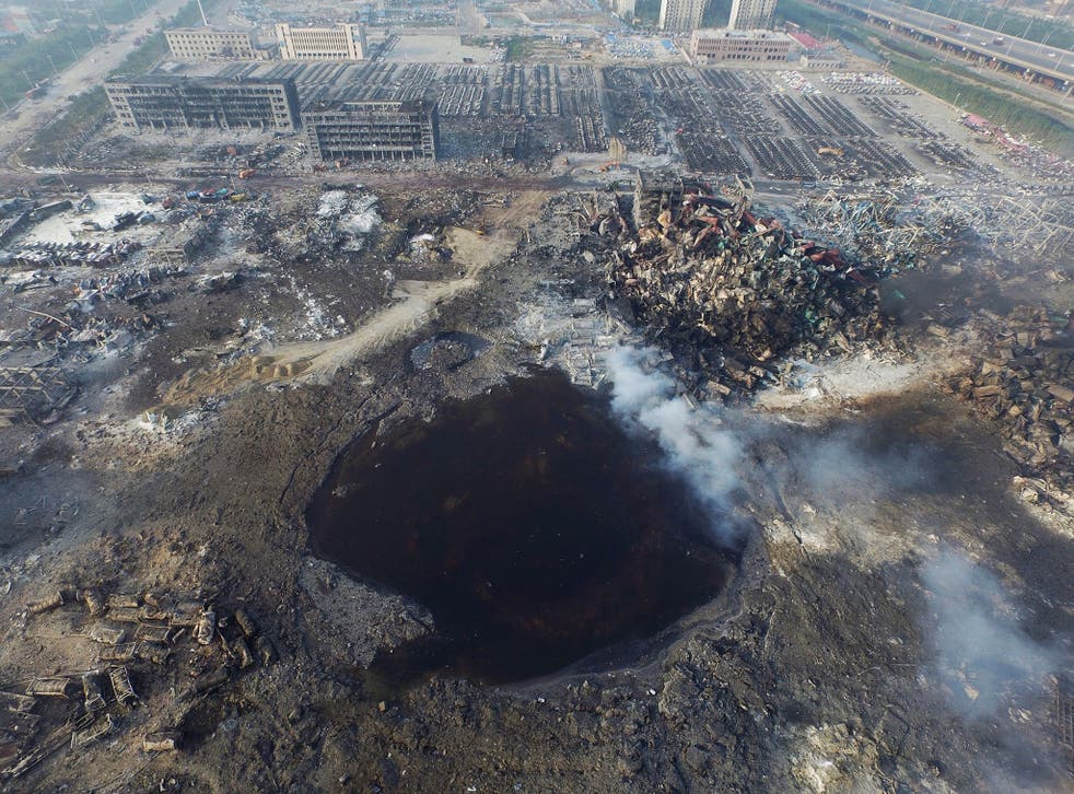 An aerial view of the crater left by a huge explosion that rocked the port city of Tianjin, China