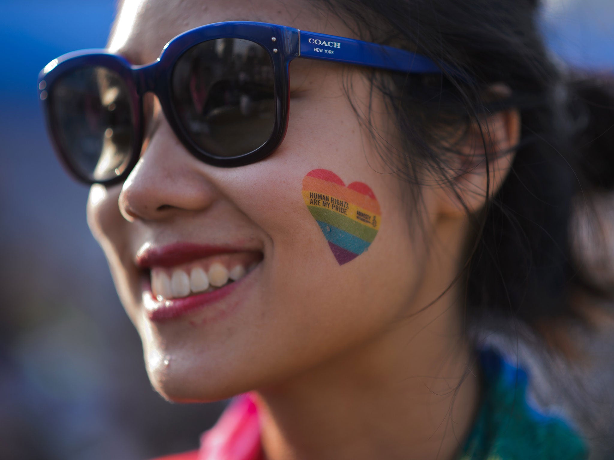 A young woman at a Gay Pride event in South Korea earlier this summer (Getty)