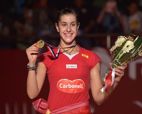 Just keep smiling: Carolina Marin kept up a brave face when organisers accidentally played the fascist lyrics to her national anthem