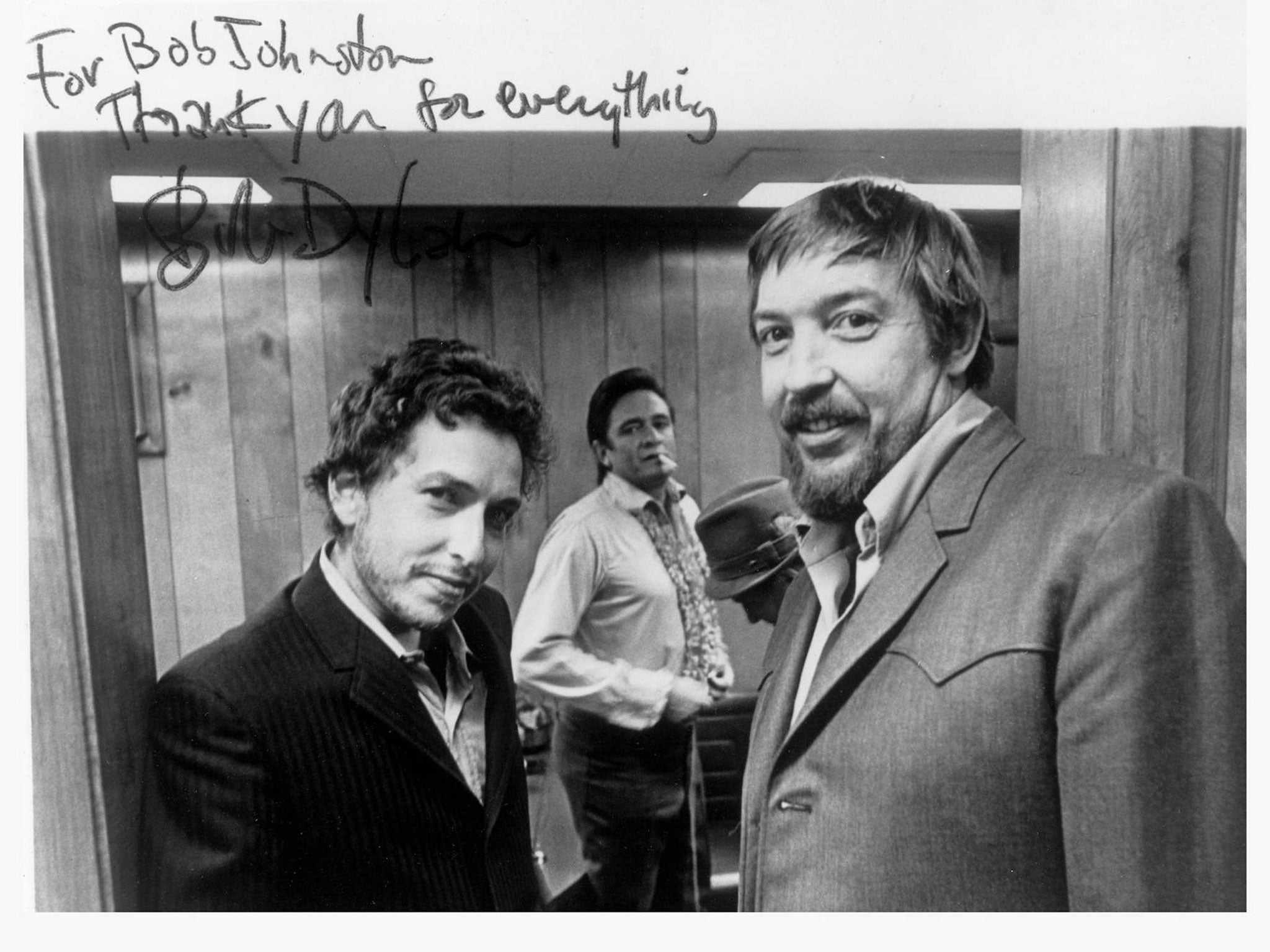 Bob Johnston, right, with Bob Dylan, left, and Johnny Cash in 1969