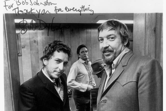 Bob Johnston, right, with Bob Dylan, left, and Johnny Cash in 1969