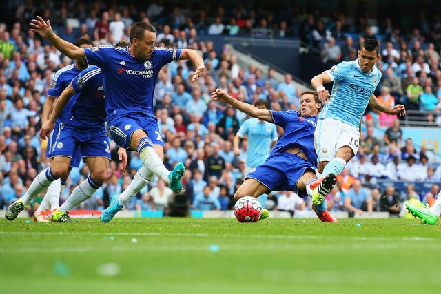 Chelsea captain John Terry, left, cannot stop Sergio Aguero putting Manchester City