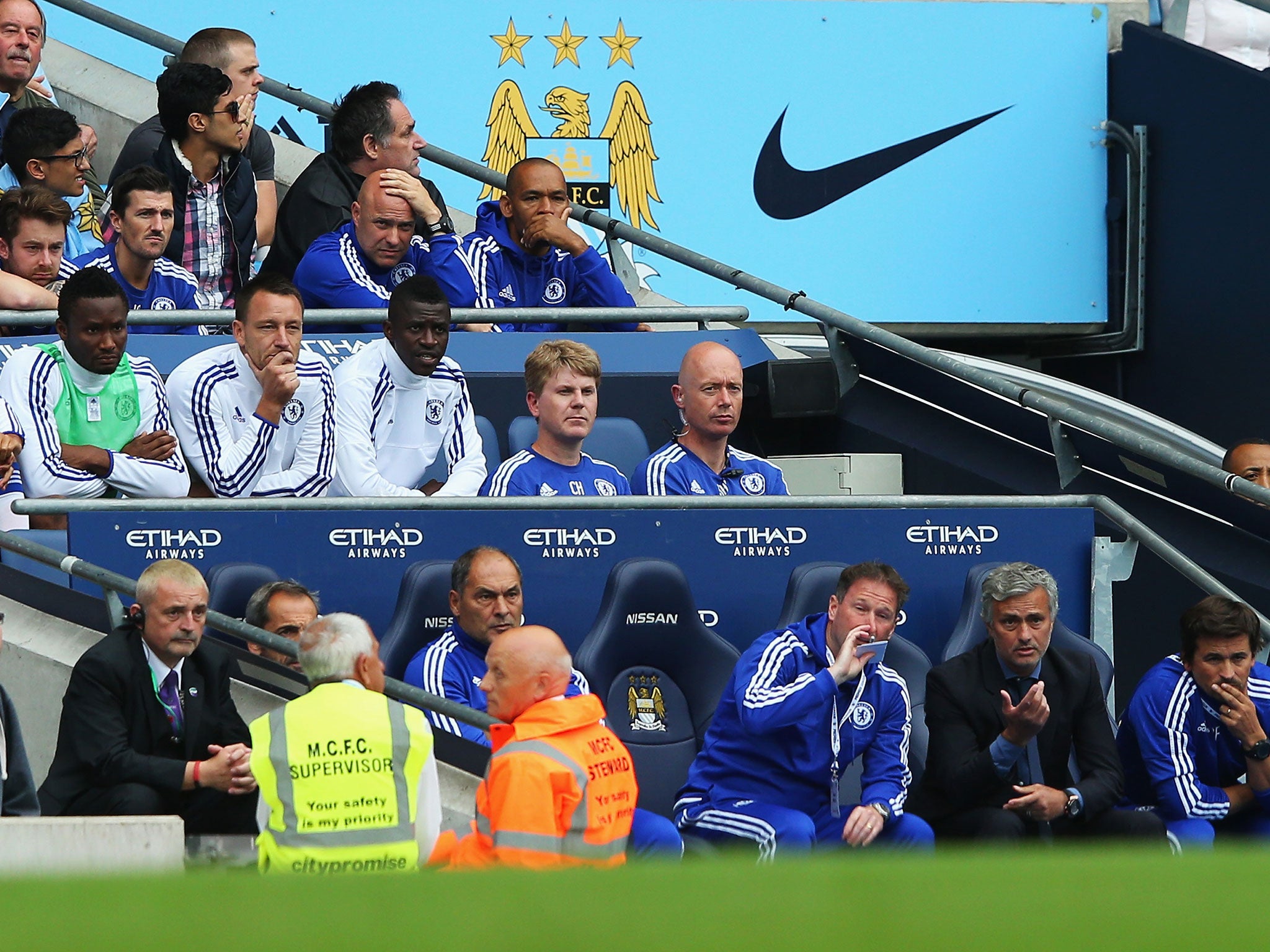 John Terry sits on the bench behind Jose Mourinho after being substituted