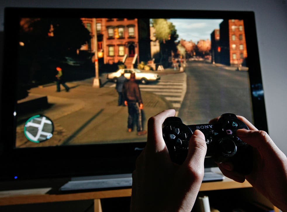 A gamer plays Grand Theft Auto IV shortly after its release in 2008