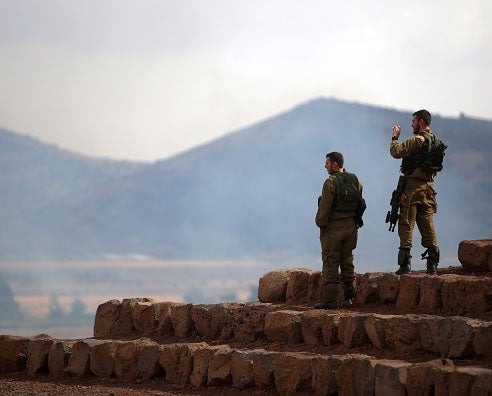 Israeli soldiers patrolling in the Golan Heights