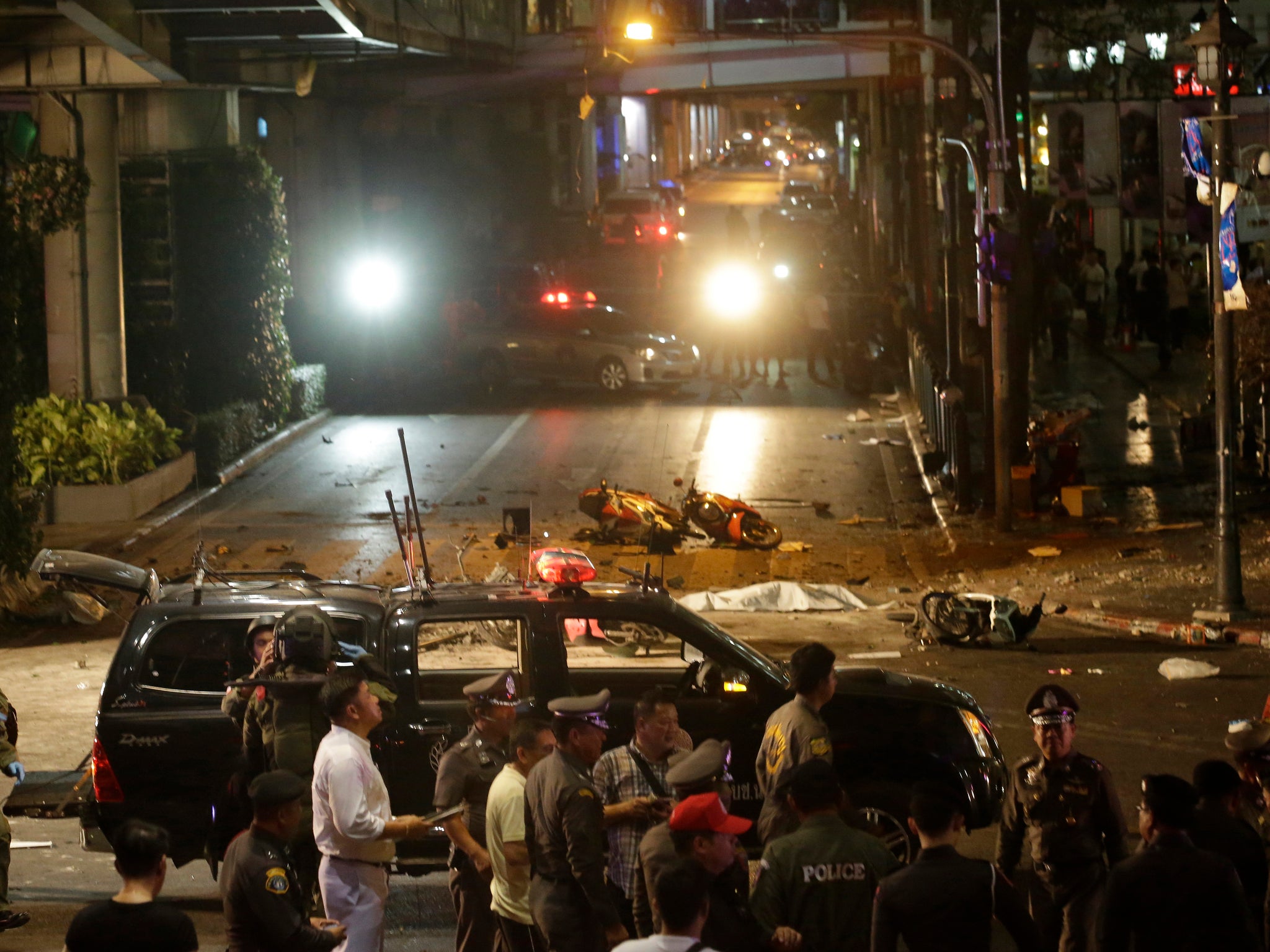 Officials close off an intersection in city center Bangkok -