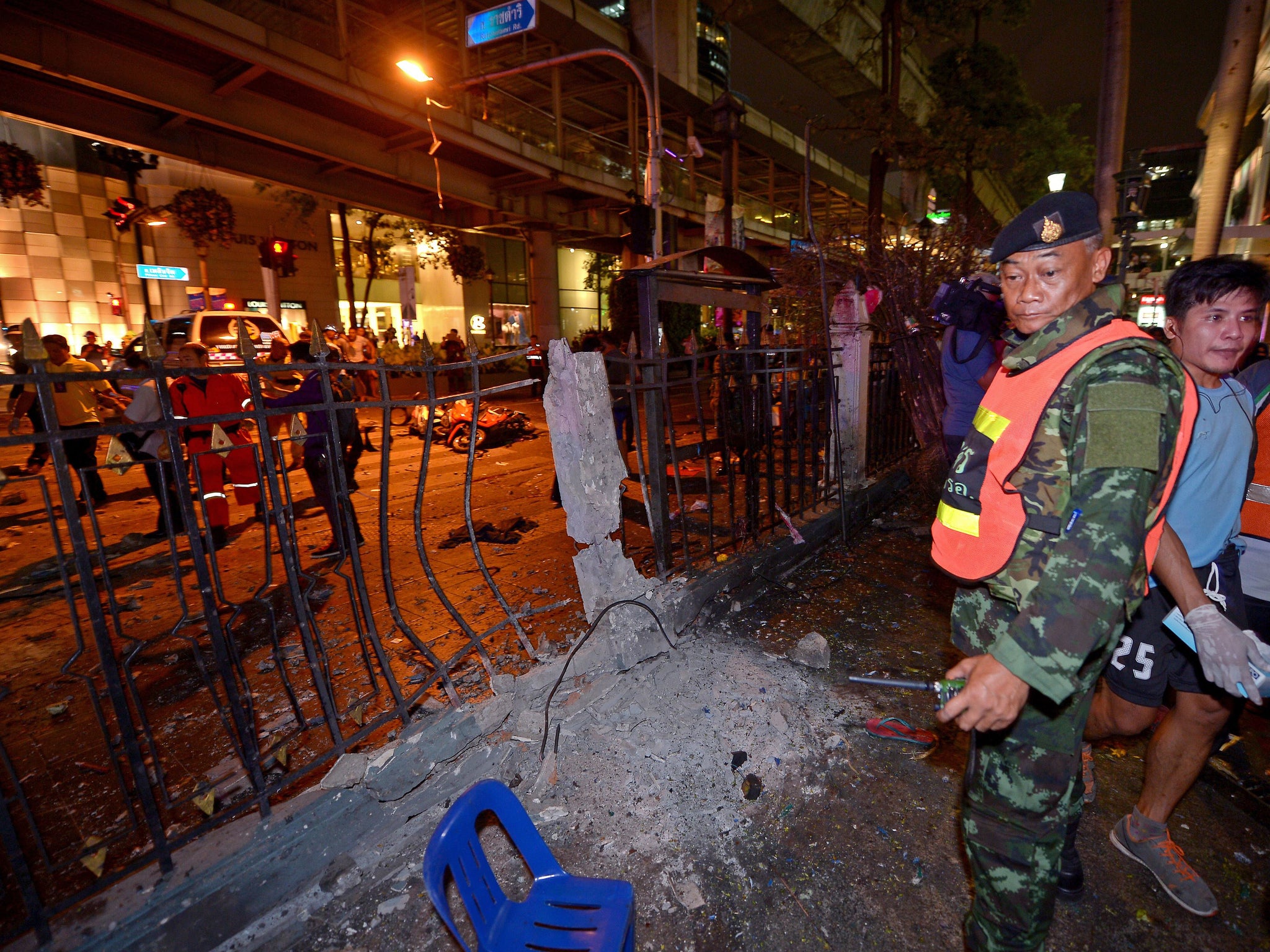 A Thai soldier looks at the damage caused by the blast (AFP Getty)