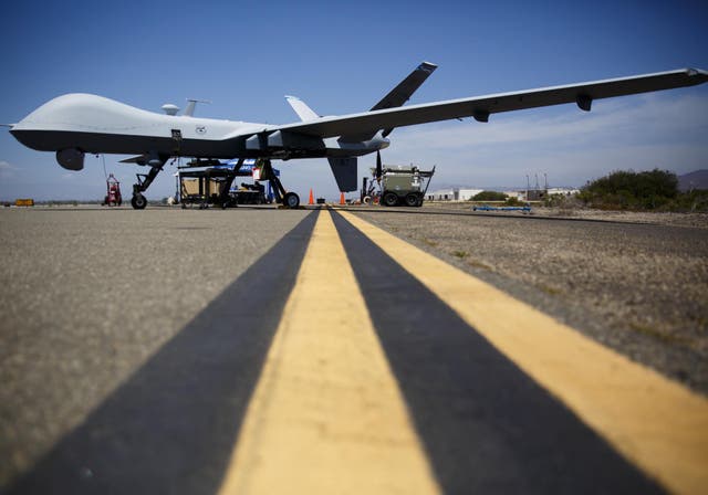 <p>A General Atomics MQ-9 Reaper stands on the runway during a drone demonstration of at a California Naval base in 2015.</p>