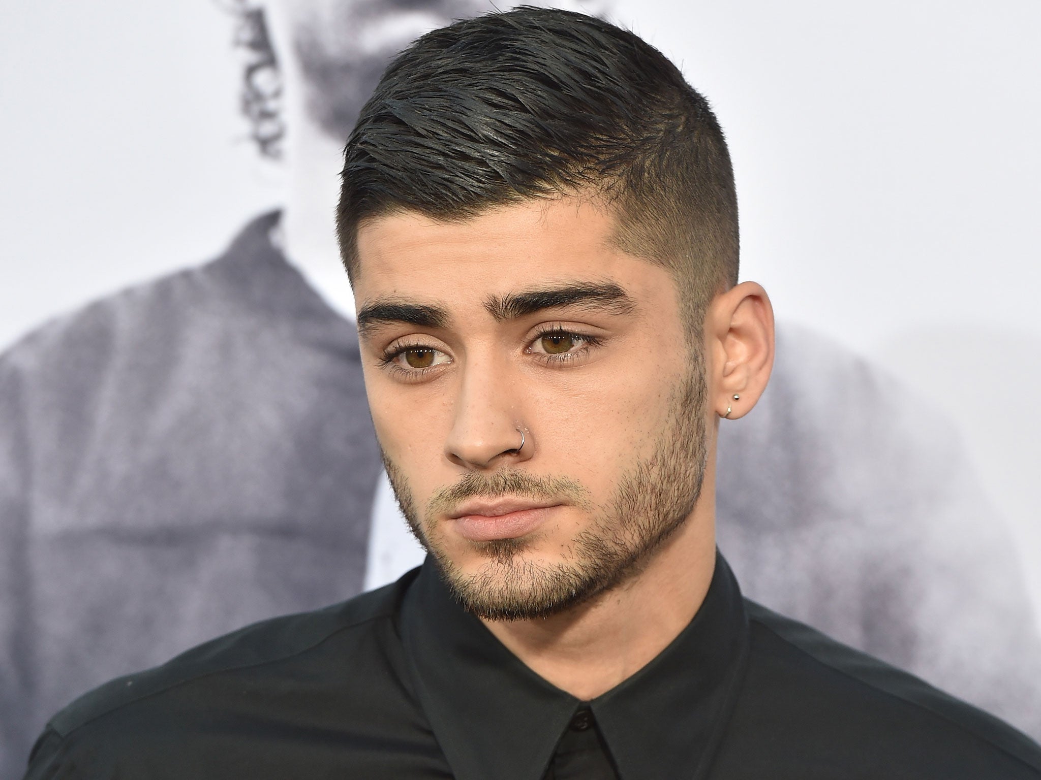 Singer Zayn Malik arrives at the premiere of Universal Pictures and Legendary Pictures' 'Straight Outta Compton' at the Microsoft Theatre on August 10, 2015 in Los Angeles, California. (Photo by Kevin Winter/Getty Images)