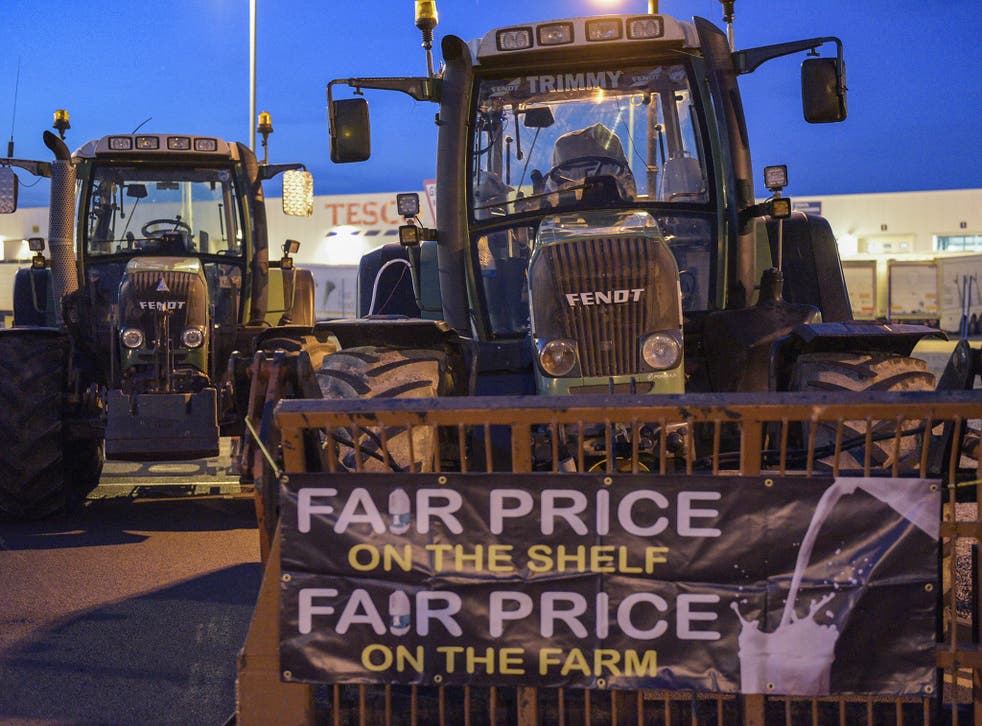 Dairy farmers blocking Tesco’s biggest distribution centre in a protest over fair prices