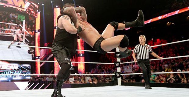 Randy Orton lands an RKO on Kevin Owens