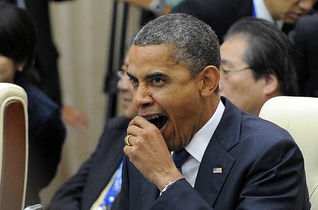 President Barack Obama trying to hide a yawn - we've seen you Prez.