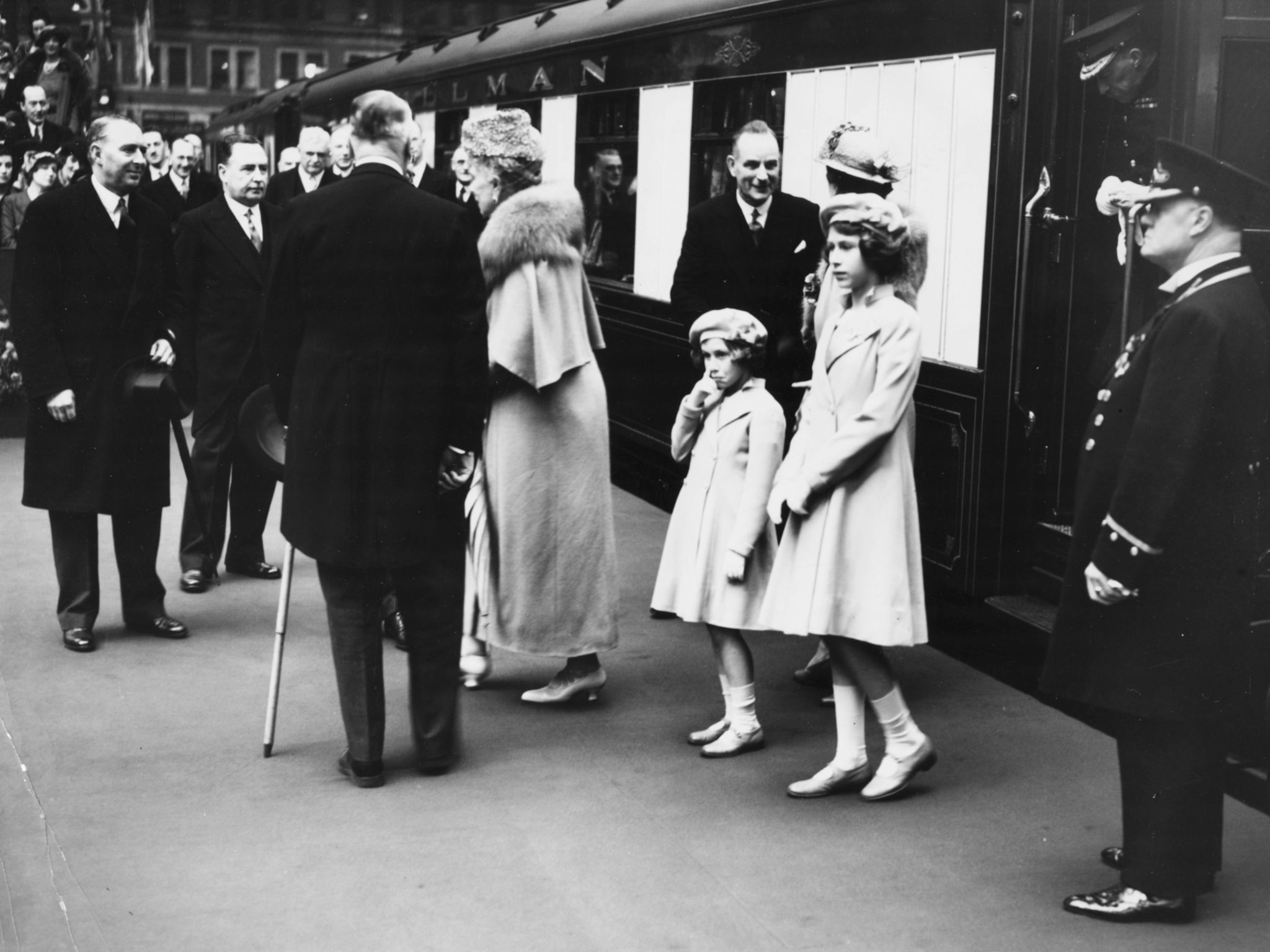 Elizabeth and her sister arrive at Waterloo station in 1939 to say goodbye to their parents as they leave to tour Canada