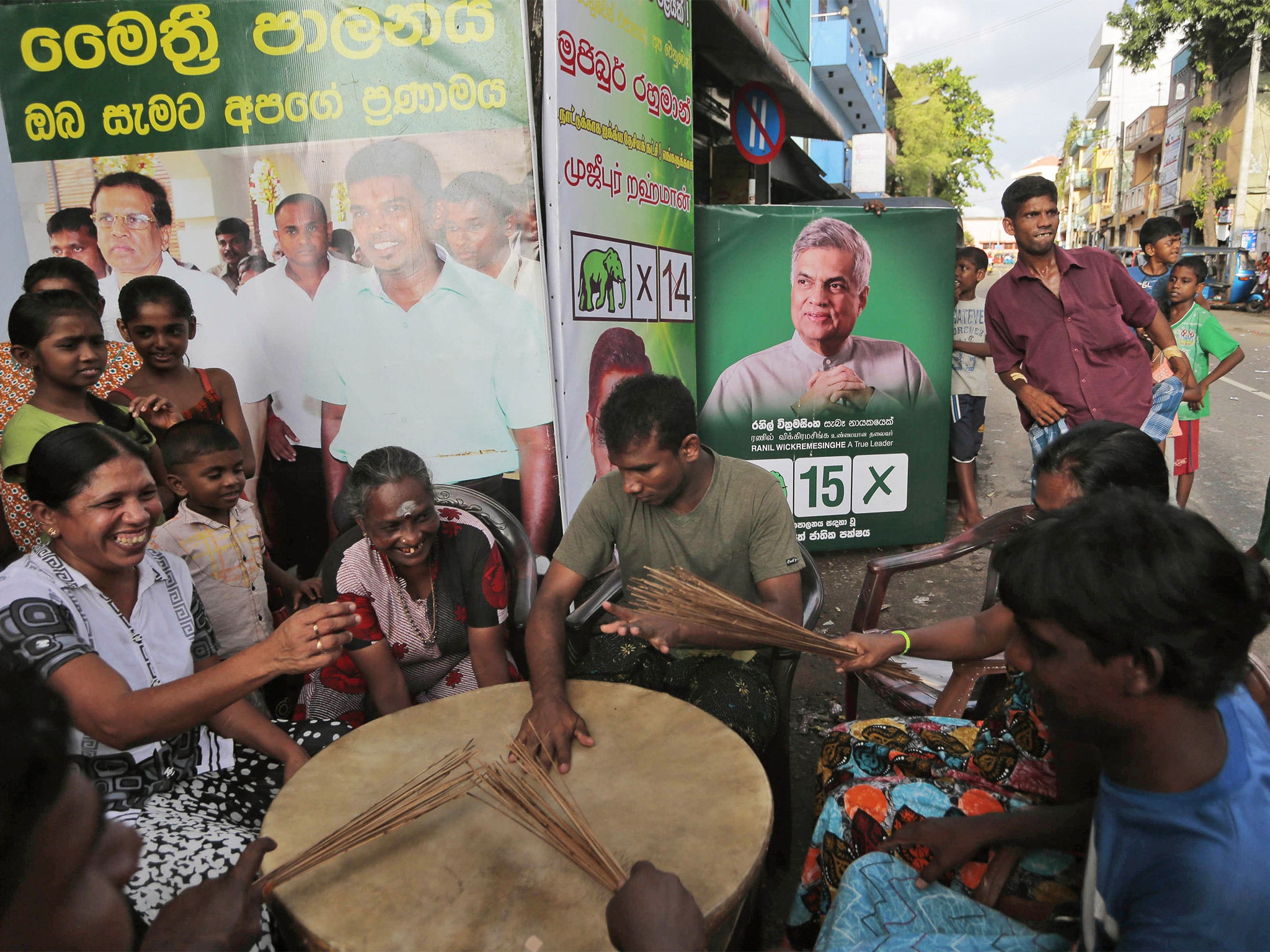 Supporters of Sri Lanka’s United National Party celebrate victory in Colombo