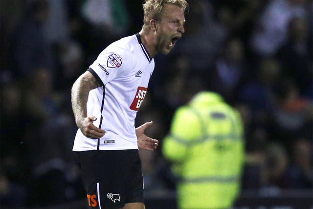 Johnny Russell celebrates scoring Derby’s 88th-minute equaliser at the iPro Stadium
