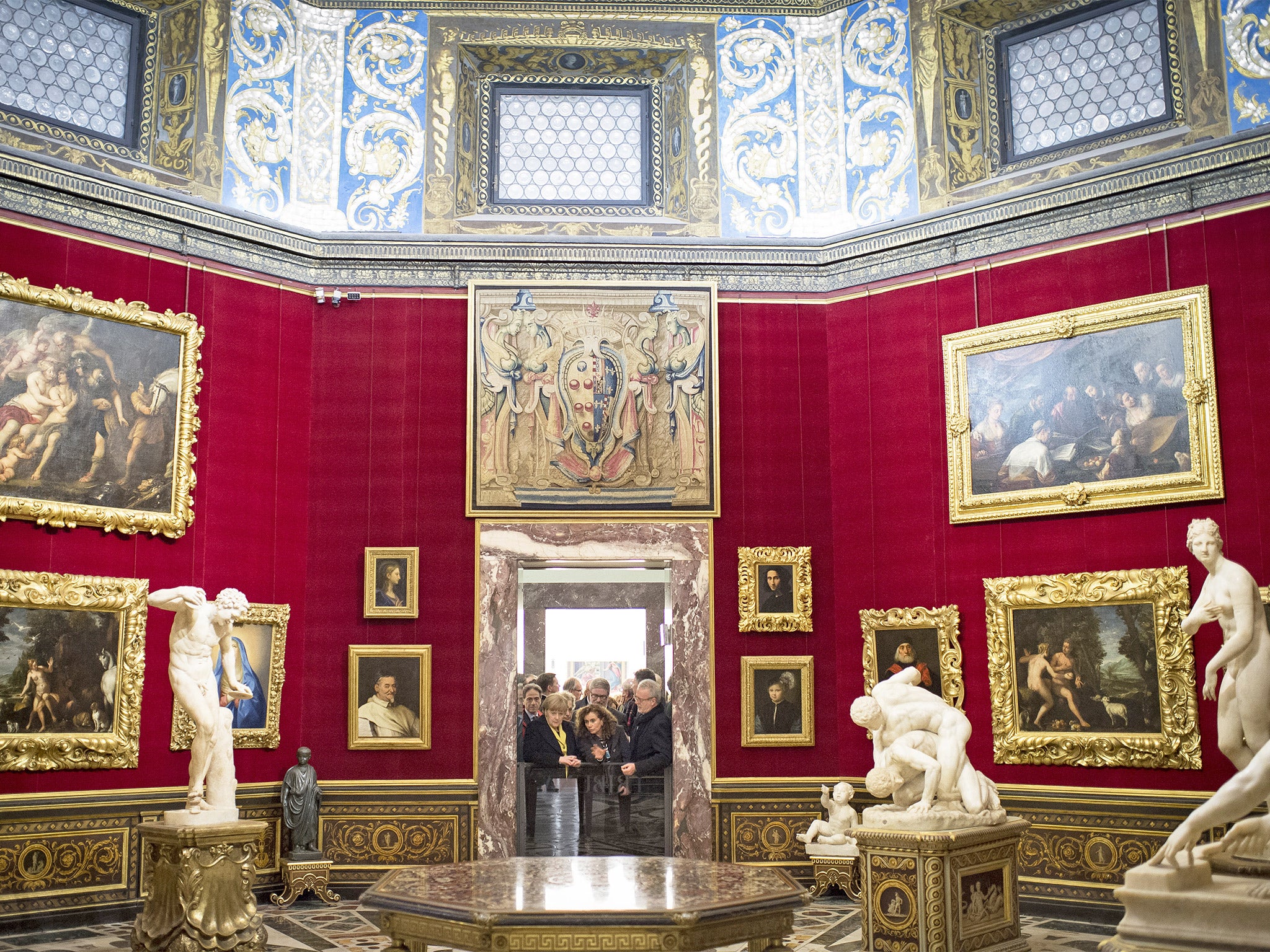 Angela Merkel, Antonio Natali and Matteo Renzi tour the Uffizi Gallery
