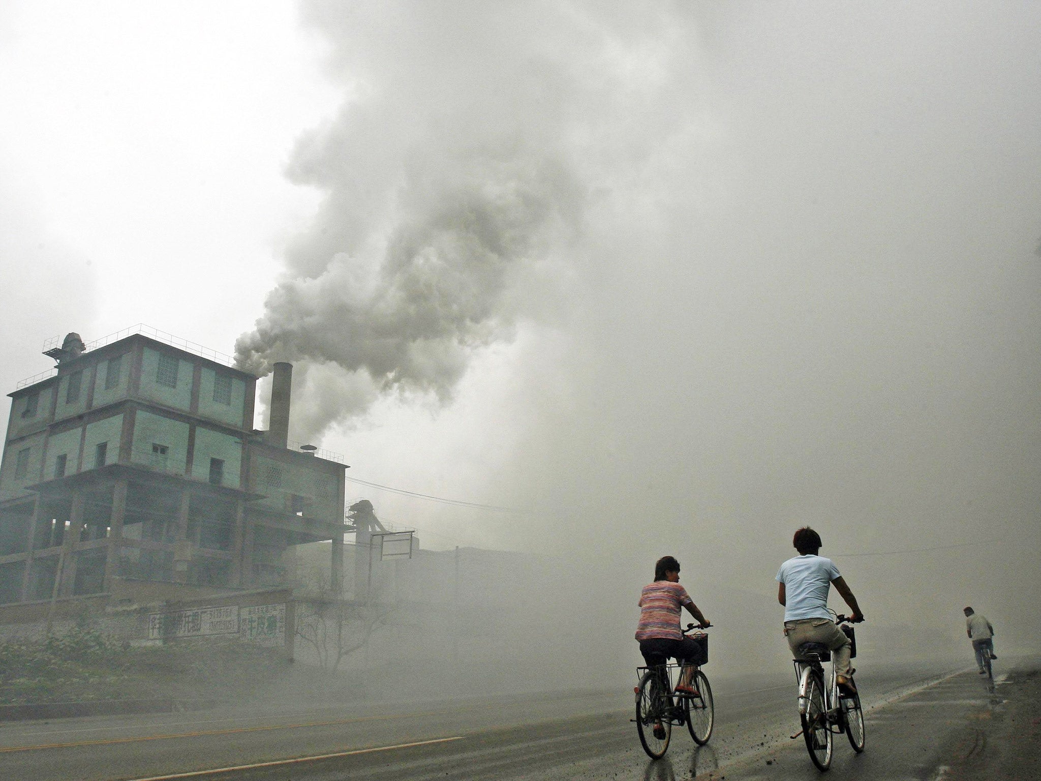 Stock image showing thick pollution from a factory in Yutian, 100km east of Beijing, China