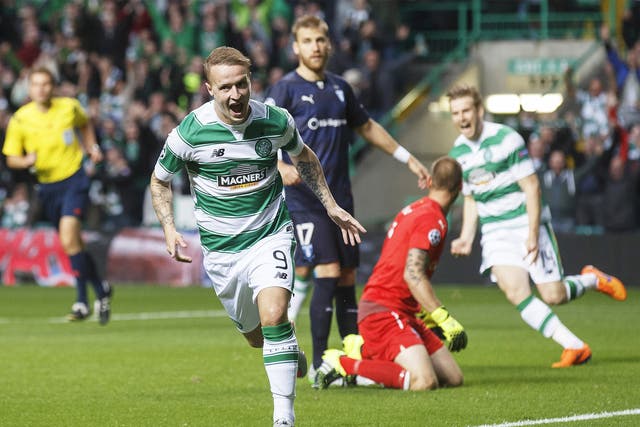 Leigh Griffiths celebrates giving Celtic an early lead as the home side went 2-0 up in 10 minutes  