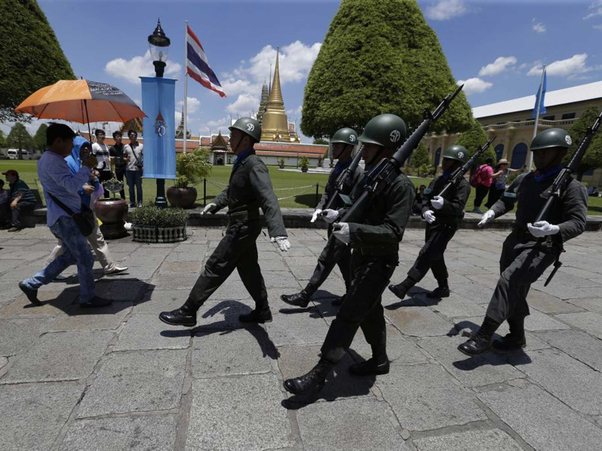 Thai police patrol in Bangkok following the bomb in Erawan Shrine