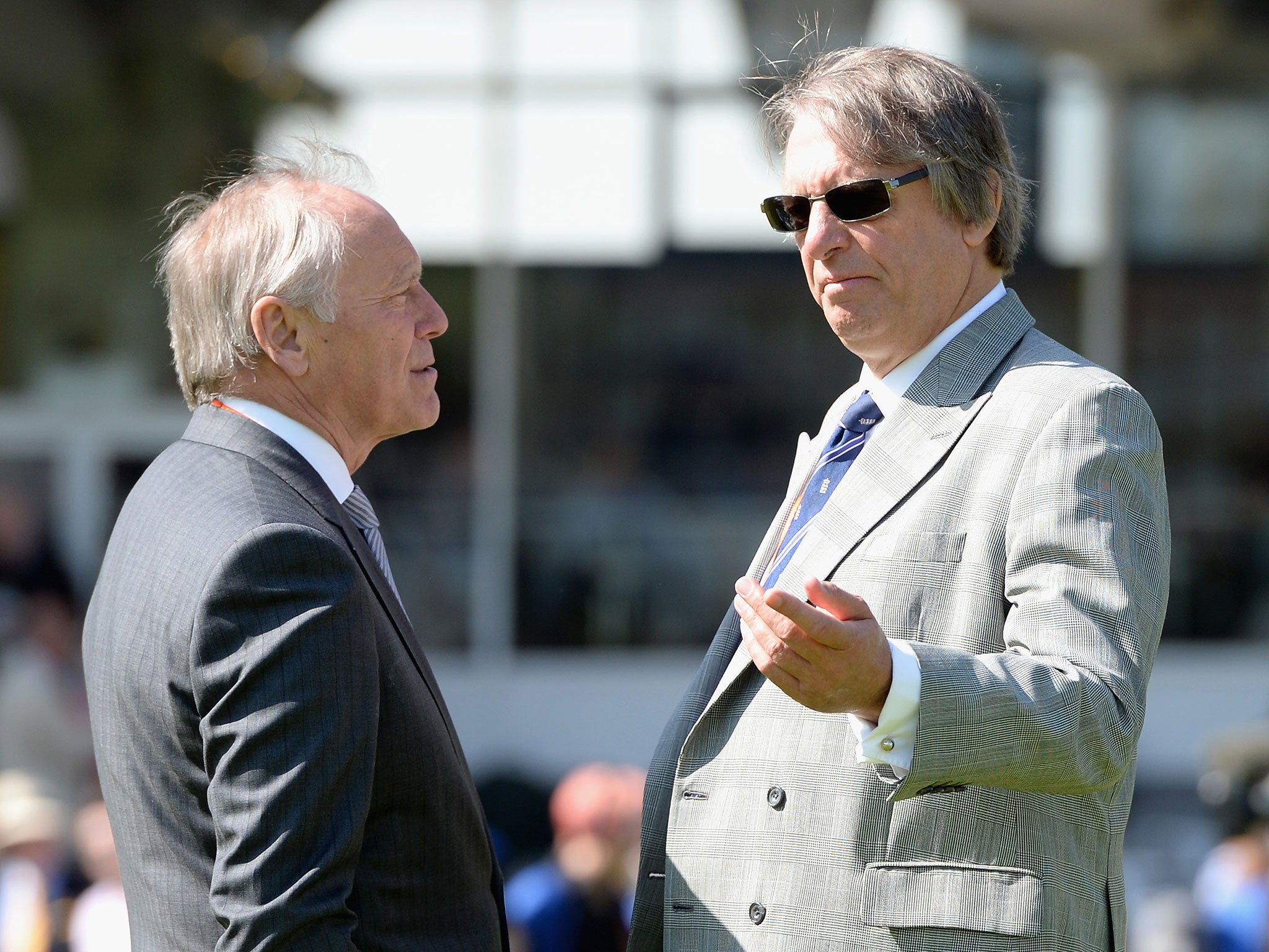 ECB president Giles Clarke (right) speaks with chairman Colin Graves