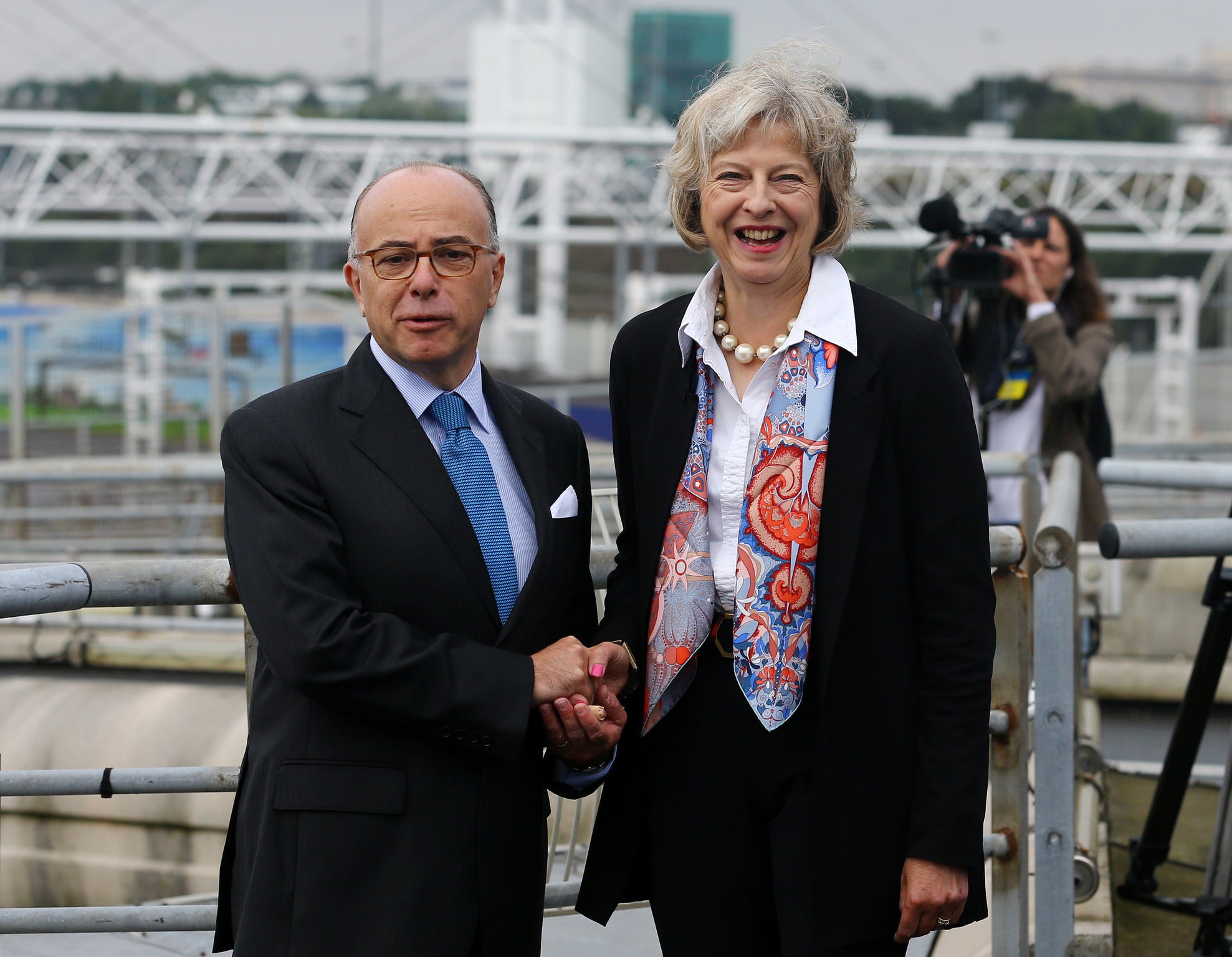 Theresa May, the Home Secretary, meets French Interior Minister Bernard Cazeneuve in Calais to sign a new deal to alleviate the migrant crisis engulfing the town