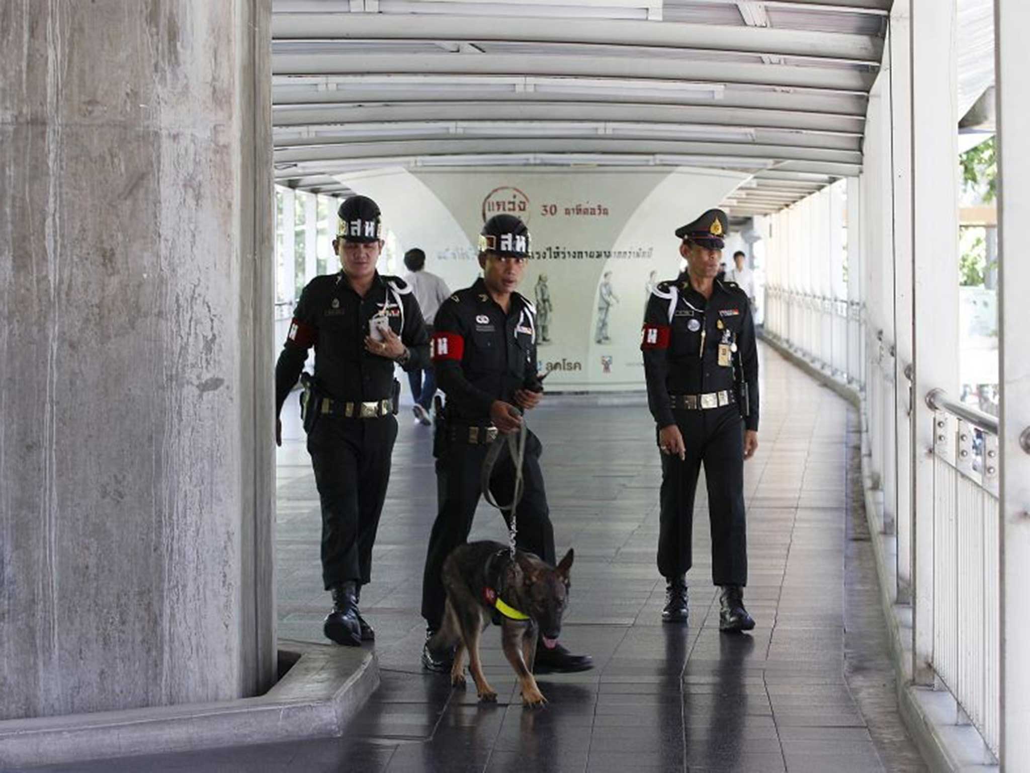 Thai officers patrol Bangkok